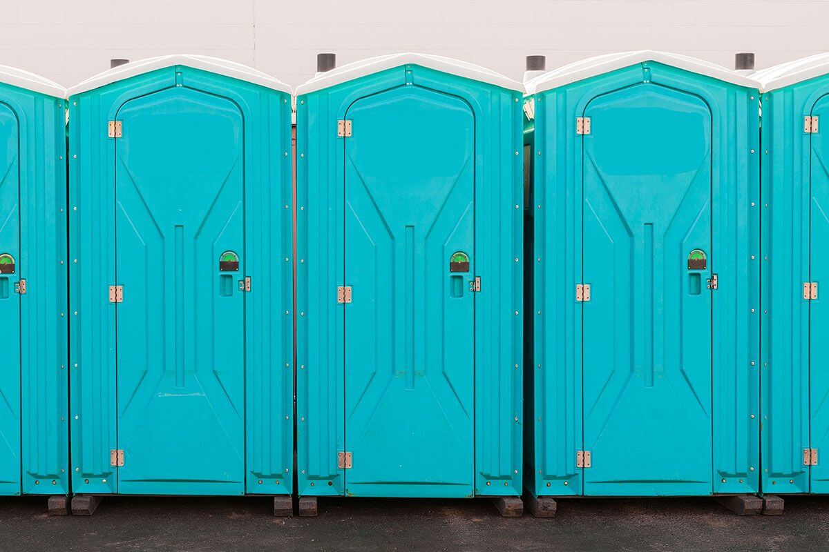 Industrial portable restroom units at a plant in Norman, Oklahoma